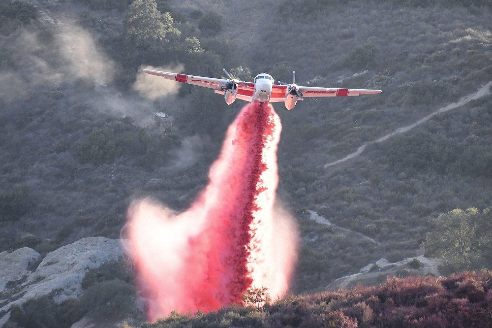 Sun Photo A00038 Cal Fire Aircraft # 34 dropping fire retardant on the Aliso Fire 6/2/2018